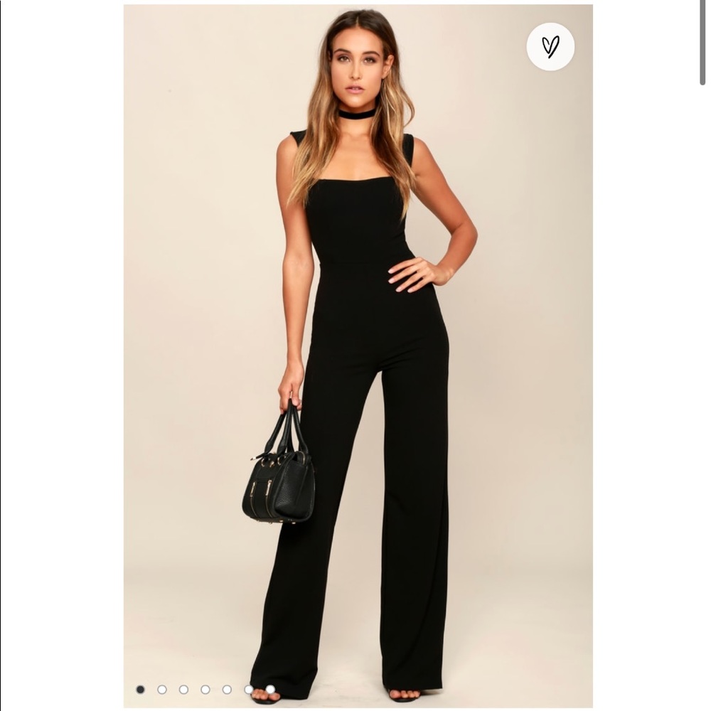 Enticing Endeavors Black Jumpsuit new with tags. Medium